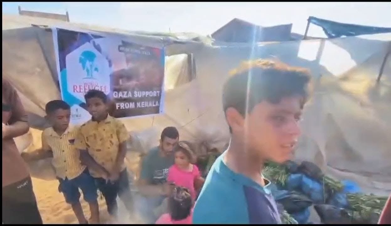 Children at the food kit distribution in a Khan Yunis camp, Gaza