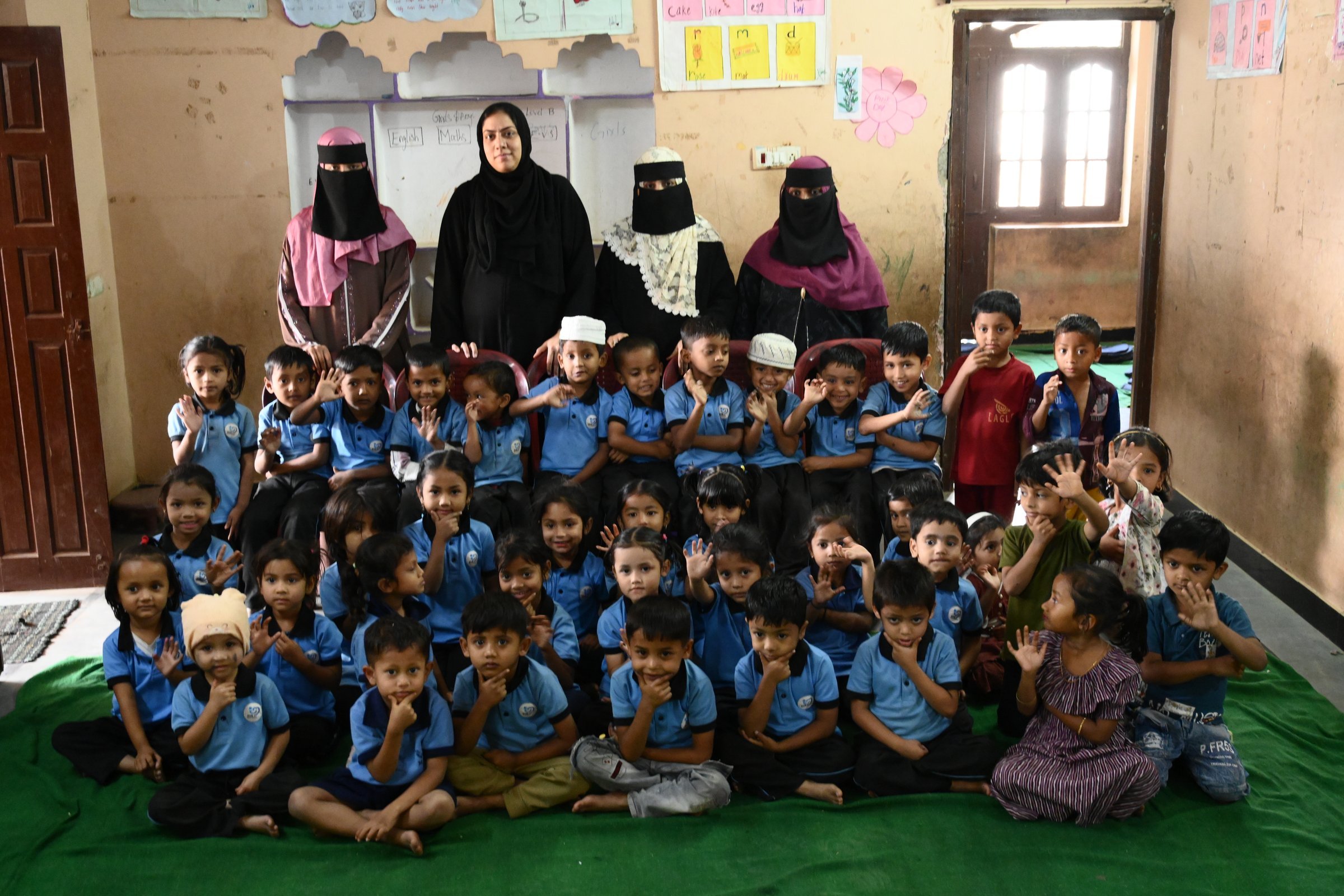 One class with their teachers at the Hyderabad school